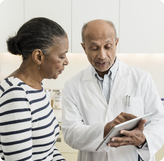 patient talking to doctor with ipad